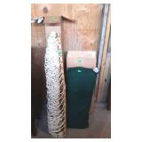 Rope Hammock with green pillow cushion in the