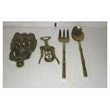 Brass lions heads door knocker, wine opener, and
