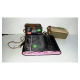Two purses and a travel makeup bag