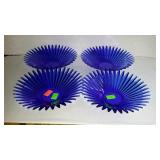 Four Cobalt bowls in the star burst design 9"