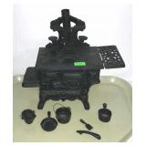 Mini cast iron stove and accessories