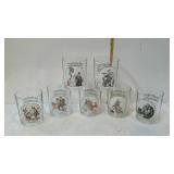 Seven Norman Rockwell high-ball glasses.