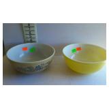 Pyrex bowls - one 10" yellow, and one 10" with