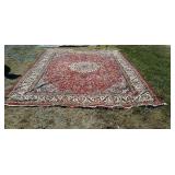 Wool oriental rug with center medallion, measures
