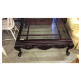 Modern accent coffee table, having the dark