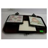 Three tile trivets with iron frames