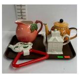 Teapots, lot of three - one peach shaped, one