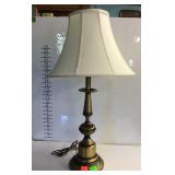Brass table lamp with fabric bell shaped shade
