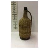 Jinn Jug, brown glass wicker wrapped bottle, 16"