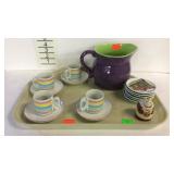 Tray lot with teacups and saucers, pitcher, and