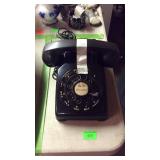 Black rotary dial telephone