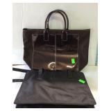 Two canvas handbags one black and one brown