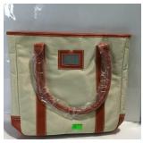 Estée Lauder Orange and beige tote with marching
