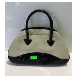 Estée Lauder black and beige handbag