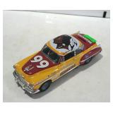 1999 Ertl die cast car bank with key & "Redskins"