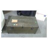 Military foot locker with hinged lid, marked U.S.
