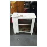 Two shelf footed cabinet, painted white, missing