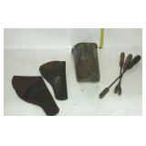 Group of early soldering irons, leather holsters