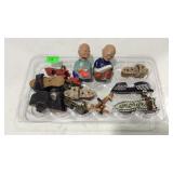 Container with Asian men and shoe figurines