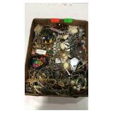 Flat of costume jewelry