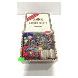 Cigar box of costume jewelry