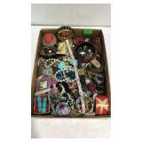 Flat of costume jewelry