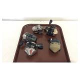 Group of 5 fishing reels,