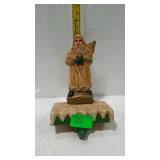 Cast iron stocking holder, fireplace mantle with