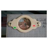 Wall hanging coat rack with center picture of a