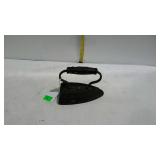 Early cast iron flat clothing iron black color