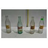 4 pop bottles, 3 Nehi, one RC Cola, this one has