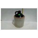 Crockery whiskey sipping jug, brown over white