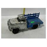 Old Hubley stake body truck, is missing one stake