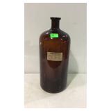 Old brown glass pharmacy bottle, label Hull Drug