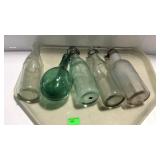 Collection of 5 bottles, one torpedo type, 3