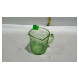 Green depression glass measuring cup