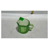 Green depression glass creamer