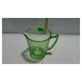Green depression glass measuring cup, but holds 4