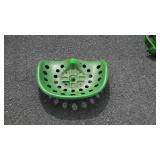 Steel implement seat, green painted