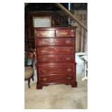 Tall dresser with two small drawers over five