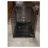 Large metal dog crate, measures 43 inches long,