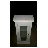 Wooden cabinet measures 15 inches long, by 8