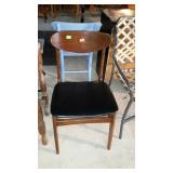 Single side chair. Wooden back and padded seat.