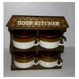 Soup bowl set in display rack. Soup Kitchen.