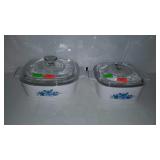 Two Pyrex covered casseroles with blue rose