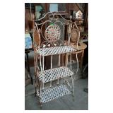 Wrought iron folding shelves. Nice medallion