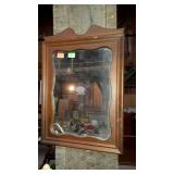 Small wood framed foyer mirror. 15"×21".