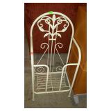 Metal framed newspaper rack. 17"×12"×35"