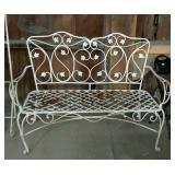 Early wrought iron garden bench, ivy motif, needs
