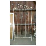 Early wrought iron garden trellis with ivy motif,